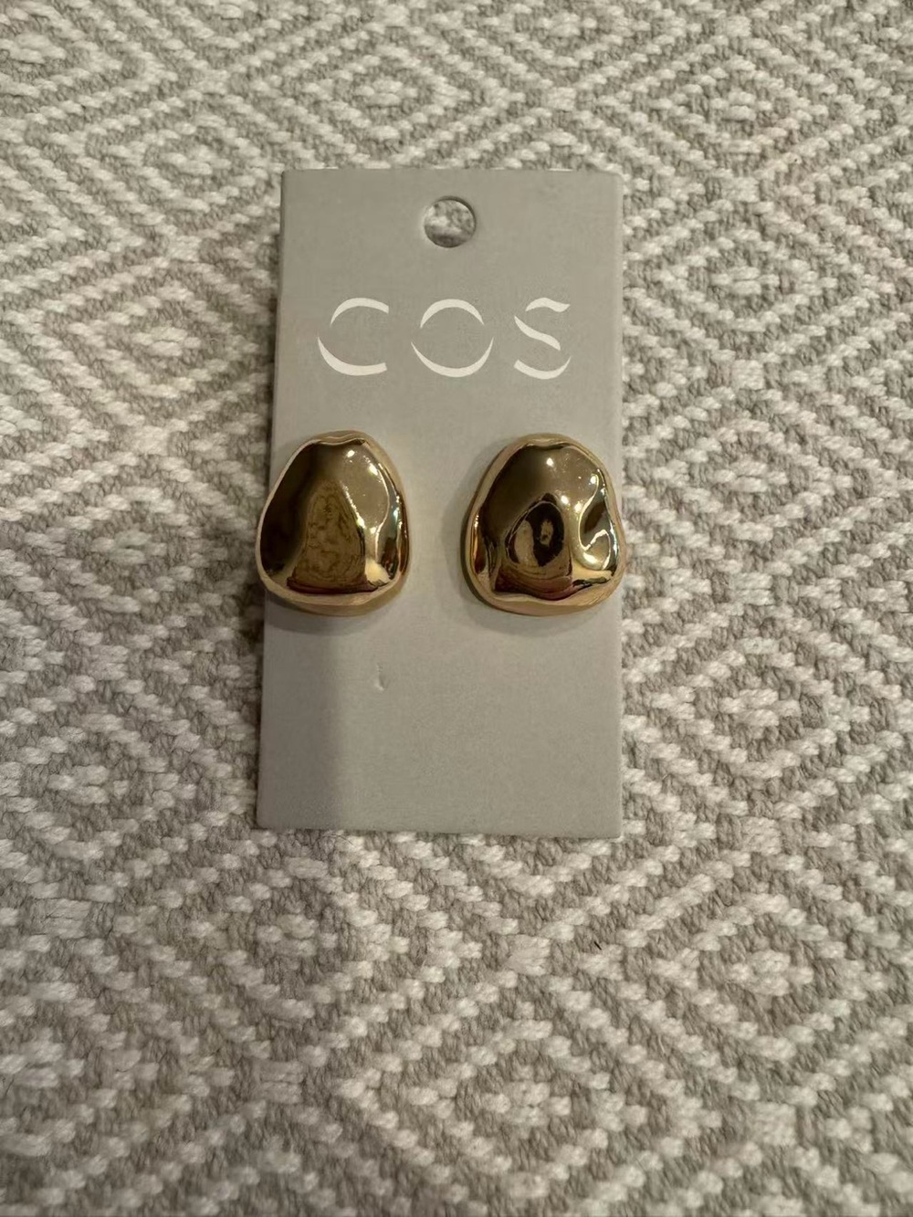 Earrings on COS card
